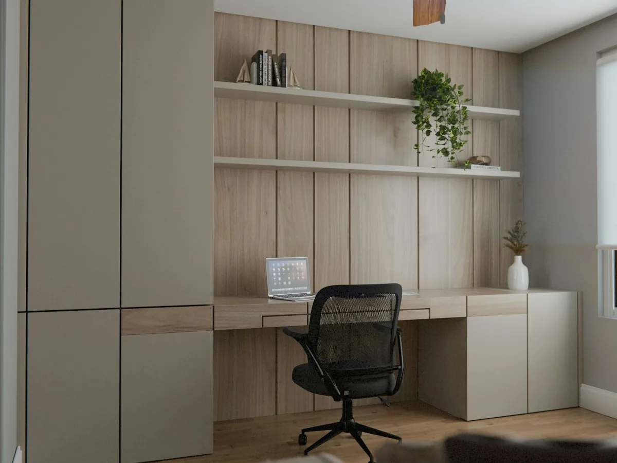 Built-in home office with pale oak slatted wall panel and floating shelves